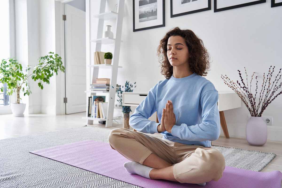 Healthy serene young woman meditating at home with eyes closed doing pilates breathing exercises, relaxing body and mind sitting on floor in living room. You can feel more grounded with therapy for women with a Broward Counselor via online therapy in Florida here. Get codependency treatment, divorce recovery, anxiety treatment and more here.